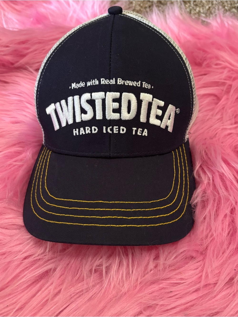 Twisted Black Trucker Hat with Yellow Stitching